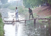 water and sanitation agency workers clean a sewerage drain amidst a downpour in faisalabad sanitation and water supply responsibilities in several more cities have been transferred from municipal corporations to wasa photo app water and sanitation agency workers clean a sewerage drain amidst a downpour in faisalabad sanitation and water supply responsibilities in several more cities have been transferred from municipal corporations to wasa photo app