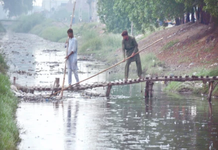 water and sanitation agency workers clean a sewerage drain amidst a downpour in faisalabad sanitation and water supply responsibilities in several more cities have been transferred from municipal corporations to wasa photo app water and sanitation agency workers clean a sewerage drain amidst a downpour in faisalabad sanitation and water supply responsibilities in several more cities have been transferred from municipal corporations to wasa photo app