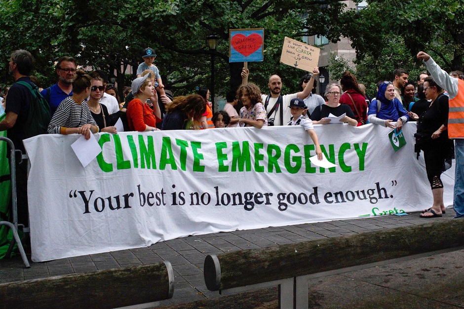 People welcome climate activist Greta Thunberg to New York as she arrives in the US. PHOTO: AFP