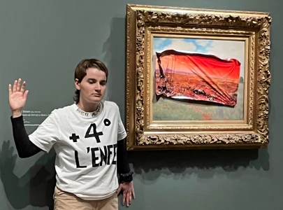 eco activist arrested for defacing monet painting in paris