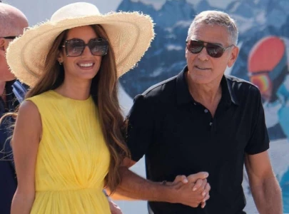 amal clooney and george clooney arrive in style for venice film festival 2024