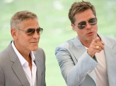 george clooney disputes 35 million dollars salary reports for wolfs