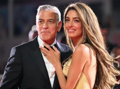 amal clooney stuns in versace and bach mai at the 2024 venice film festival amal clooney stuns in versace and bach mai at the 2024 venice film festival