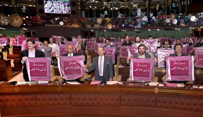 members of the sindh assembly display banners carrying the sindhi inscription sindh ji dharti munhinji maa the land of sindh is my mother during a session in karachi on thursday photo x sindhcmhouse