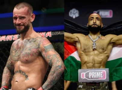 cm punk gives shout out to ufc champ belal muhammad during wwe raw