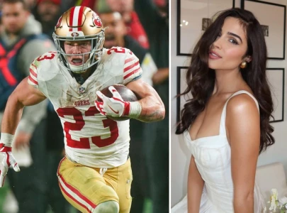 christian mccaffrey defends olivia culpo after wedding dress critique