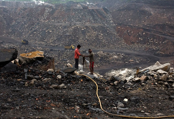 workers drill at an open cast coal field at dhanbad district in the eastern indian state of jharkhand september 18 2012 reuters ahmad masood