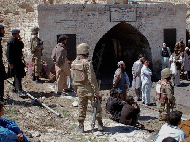 file photo of security personnel standing guard near a coalmine in balochistan