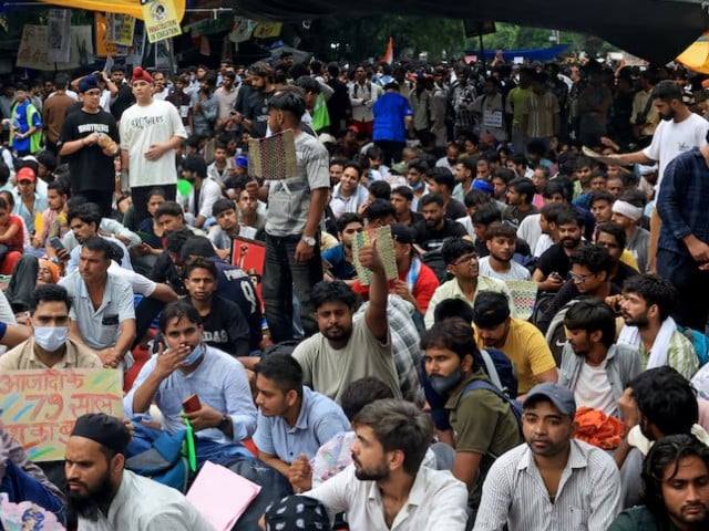Supporters of India's Cockroach Janta Party (CJP) attend the ongoing protest, days after thousands of protesters marched towards parliament demanding the resignation of Education Minister over National Eligibility cum Entrance Test (NEET) examination paper leaks, at Jantar Mantar in New Delhi, India July 25, 2026. Photo: REUTERS