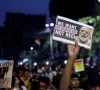 a man holds a poster as he participates in a demonstration held in solidarity with cockroach janta party cjp protests held at jantar mantar in new delhi which demand the resignation of india s education minister dharmendra pradhan over exam paper leaks in kolkata india july 24 2026 photo reuters