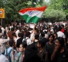 a supporter of india s cockroach janata party cjp holds an indian national flag at the ongoing protest site a few days after thousands of protesters marched towards parliament demanding the resignation of education minister dharmendra pradhan over national eligibility cum entrance test neet examination paper leaks at jantar mantar in new delhi india july 23 2026 photo reuters a supporter of india s cockroach janata party cjp holds an indian national flag at the ongoing protest site a few days after thousands of protesters marched towards parliament demanding the resignation of education minister dharmendra pradhan over national eligibility cum entrance test neet examination paper leaks at jantar mantar in new delhi india july 23 2026 photo reuters