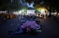 a person sleeps inside a mosquito net during a sit in protest called by cockroach janta party cjp demanding the resignation of indian education minister dharmendra pradhan at jantar mantar in new delhi india june 29 2026 reuters