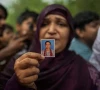 habibunnisa mother of sheikh sana 19 an aspirant doctor who took her own life before the national eligibility cum entrance test neet exam retest shows a picture of her daughter at the cockroach janta party cjp protest site a day after thousands of protesters marched toward parliament demanding the resignation of education minister dharmendra pradhan over neet examination paper leaks at jantar mantar in new delhi india july 21 2026 reuters