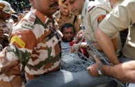 police detain a demonstrator during a protest demanding the resignation of india s chief election commissioner gyanesh kumar in new delhi india october 3 2026 reuters