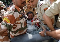 police detain a demonstrator during a protest demanding the resignation of india s chief election commissioner gyanesh kumar in new delhi india october 3 2026 reuters