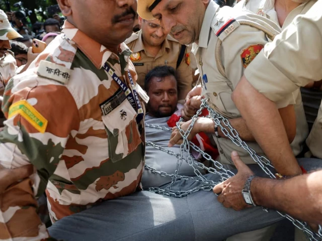 police detain a demonstrator during a protest demanding the resignation of india s chief election commissioner gyanesh kumar in new delhi india october 3 2026 reuters police detain a demonstrator during a protest demanding the resignation of india s chief election commissioner gyanesh kumar in new delhi india october 3 2026 reuters