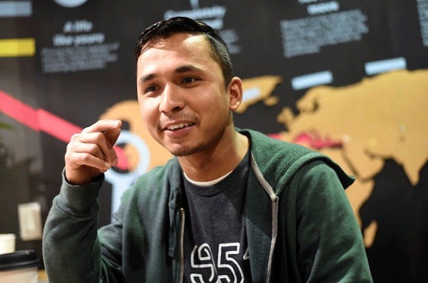 Employee Meg Karki of Butan speaks to a reporter at 1951 Coffee Company in Berkeley, California, February 9, 2017. PHOTO: AFP