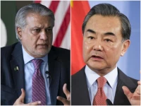 foreign minister ishaq dar l and china s foreign minister wang yi photos file