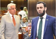 defence minister khawaja asif l and information minister attaullah tarar photo files