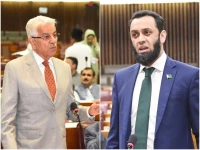 defence minister khawaja asif l and information minister attaullah tarar photo files