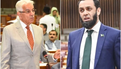 defence minister khawaja asif l and information minister attaullah tarar photo files