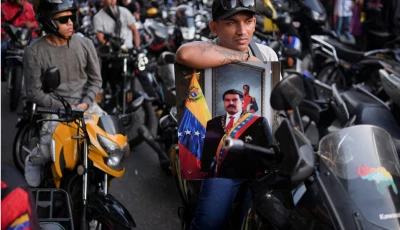 members of the group known as colectivos take part in a march calling for the release of venezuela s president nicolas maduro after he and his wife cilia flores were captured following u s strikes on venezuela in caracas venezuela january 4 2026 source reuters