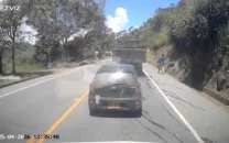 colombia explosives attack kills 13 police source says