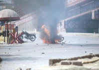 a motorcycle burns after being set ablaze by unidentified men near the us consulate during a protest against the assassination of iran s supreme leader ayatollah ali khamenei in israeli us airstrikes on the islamic republic photo ppi