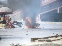 a motorcycle burns after being set ablaze by unidentified men near the us consulate during a protest against the assassination of iran s supreme leader ayatollah ali khamenei in israeli us airstrikes on the islamic republic photo ppi
