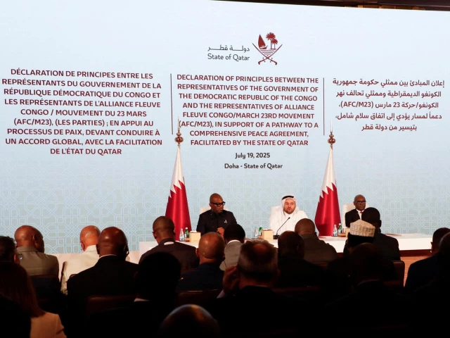 representatives from drc qatar and m23 attend the signing ceremony for a declaration of principles to end fighting in eastern congo in doha qatar july 19 2025 photo afp