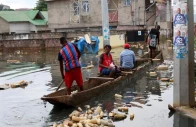 people use a boat to move after the congo river rises to its highest level causing flooding in kinshasa democratic republic of congo january 10 2024 reuters people use a boat to move after the congo river rises to its highest level causing flooding in kinshasa democratic republic of congo january 10 2024 reuters