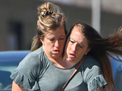 conjoined twins abby and brittany hensel enjoy hometown errands after baby sighting conjoined twins abby and brittany hensel enjoy hometown errands after baby sighting