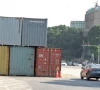 goods worth millions at risk as containers held for weeks