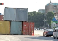 goods worth millions at risk as containers held for weeks