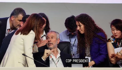 cop30 president andre correa do lago talks with people before the plenary session during the un climate change conference cop30 in belem brazil november 22 2025 photo reuters