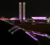 slogans are projected by greenpeace activists onto brazil s national congress to urge cop30 negotiators to protect forests and the amazon as part of efforts to combat the climate crisis in brasilia brazil october 11 2025 photo reuters