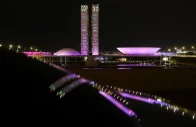 slogans are projected by greenpeace activists onto brazil s national congress to urge cop30 negotiators to protect forests and the amazon as part of efforts to combat the climate crisis in brasilia brazil october 11 2025 photo reuters