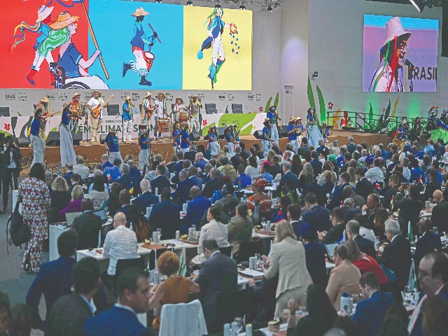 artists perform during the opening ceremony of the general plenary of leaders in the framework of the cop30 un climate change conference in belem para state brazil photo afp artists perform during the opening ceremony of the general plenary of leaders in the framework of the cop30 un climate change conference in belem para state brazil photo afp