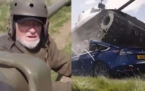 watch world war 2 veteran runs over tesla in anti musk protest watch world war 2 veteran runs over tesla in anti musk protest