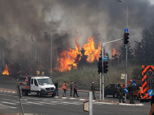israeli security and rescue personnel work near latrun in central israel on wednesday as wildfires due to extreme heat and winds broke out in central israel photograph oren ben hakoon reuters israeli security and rescue personnel work near latrun in central israel on wednesday as wildfires due to extreme heat and winds broke out in central israel photograph oren ben hakoon reuters