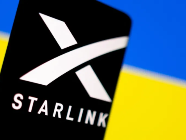 a starlink logo on a smartphone in front of a ukrainian flag on february 27 2022 dado ruvic reuters