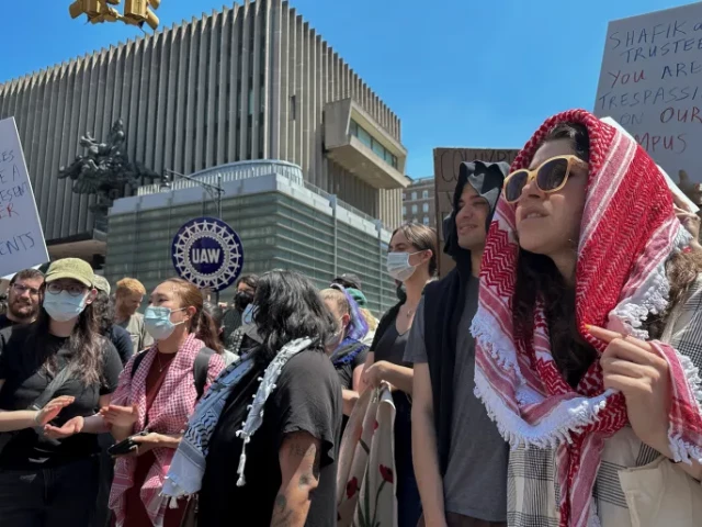 columbia university students and pro palestine protesters march in front of hamilton hall in manhattan new york city on may 1 2024 reuters roselle chen