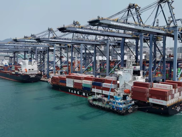 a drone view shows containers at the terminals at the port in kwai chung in hong kong china april 3 2025 reuters tyrone siu a drone view shows containers at the terminals at the port in kwai chung in hong kong china april 3 2025 reuters tyrone siu