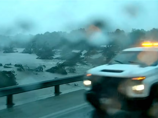 First responders survey rising flood waters of the Guadalupe River after flash flooding in Kerr County, Texas, U.S. July 4, 2025 in a still image from video. ABC Affiliate KSAT via REUTERS
