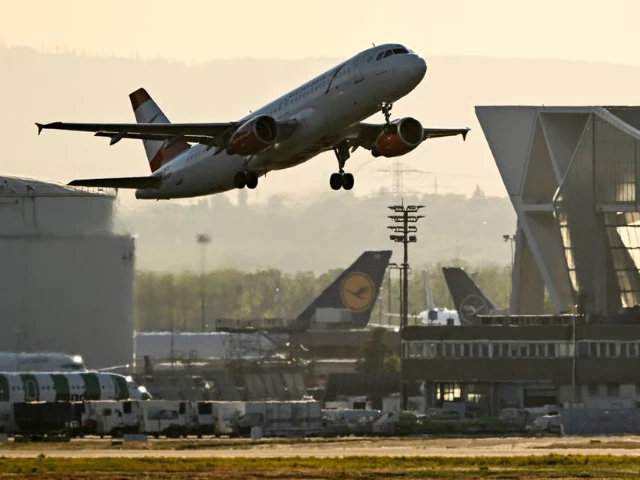 a lufthansa plane is seen at sunset at the airport in frankfurt am main western germany in april photo afp a lufthansa plane is seen at sunset at the airport in frankfurt am main western germany in april photo afp