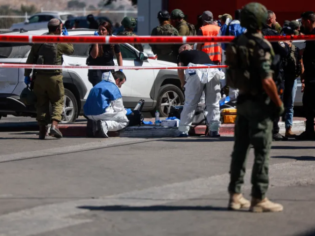 Israeli security personnel stand guard near the scene of a stabbing attack in Gush Etzion in the occupied West Bank on July 10, 2025 [Ammar Awad/Reuters]