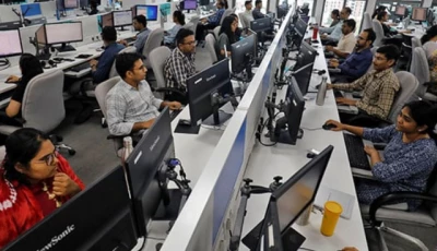 employees work on their terminals inside an office photo reuters
