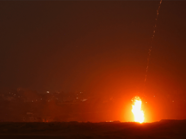 A beam of light is seen resulting from an explosion, as seen from the Israeli side of the Israel-Gaza border on July 10, 2025. — Reuters