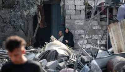 palestinians sit in the rubble of a house after an overnight israeli strike on the nuseirat refugee camp in the central gaza strip on july 13 2025 eyad baba afp