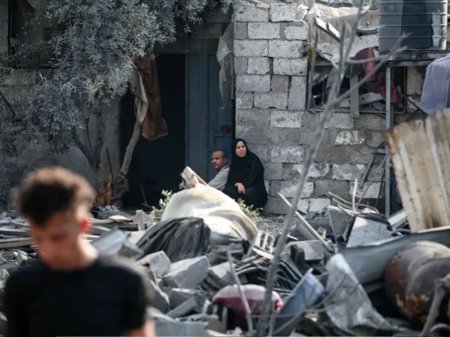 palestinians sit in the rubble of a house after an overnight israeli strike on the nuseirat refugee camp in the central gaza strip on july 13 2025 eyad baba afp palestinians sit in the rubble of a house after an overnight israeli strike on the nuseirat refugee camp in the central gaza strip on july 13 2025 eyad baba afp